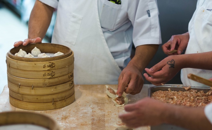 team of people cooking