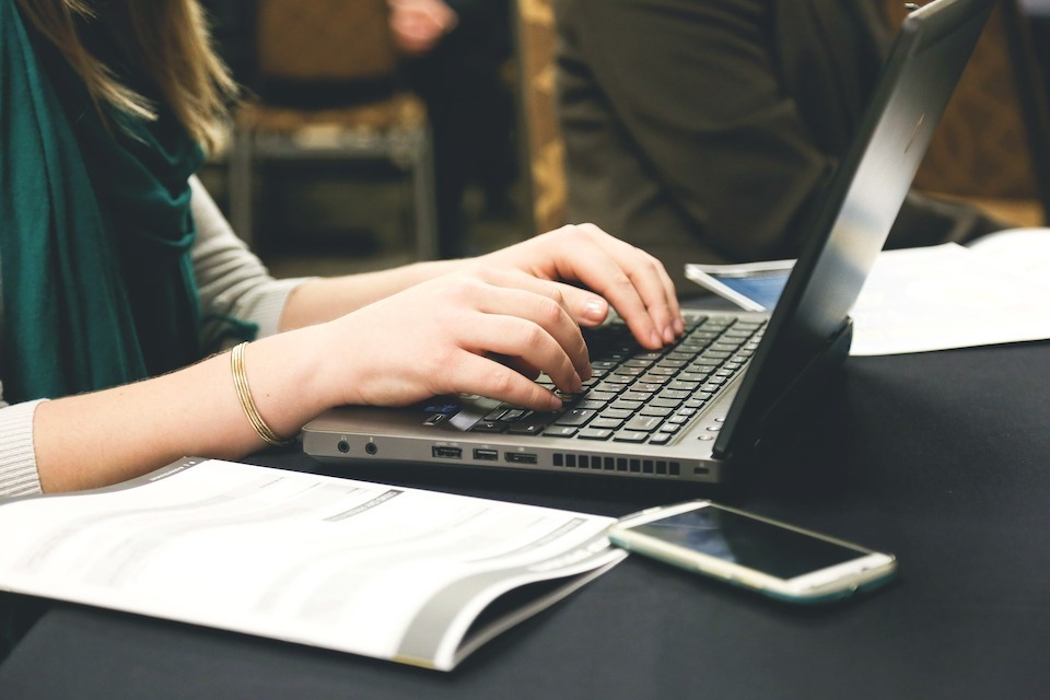 Person placing online bookings for an event